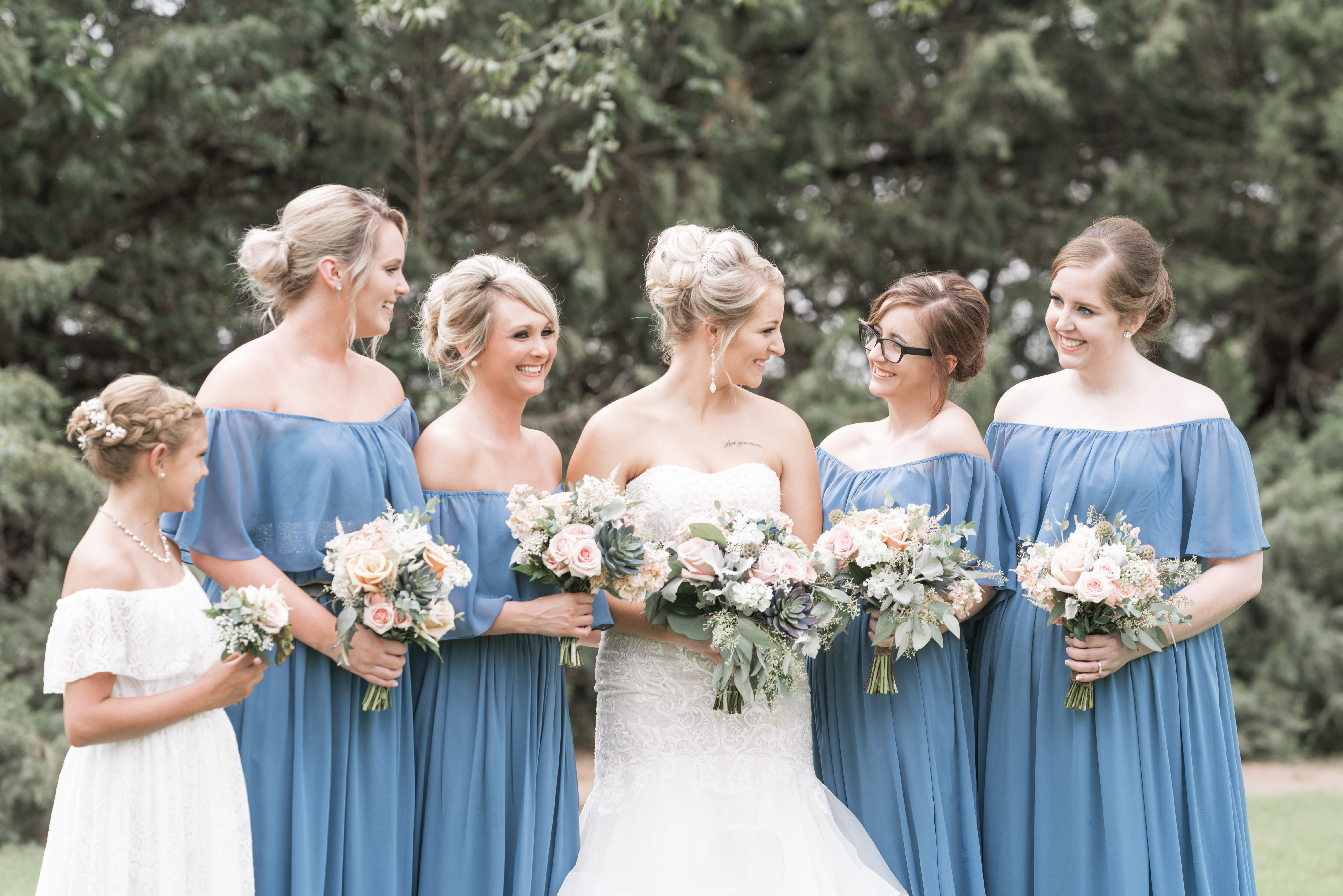 bridesmaids laughing because they avoided these 3 things that affect your wedding timeline