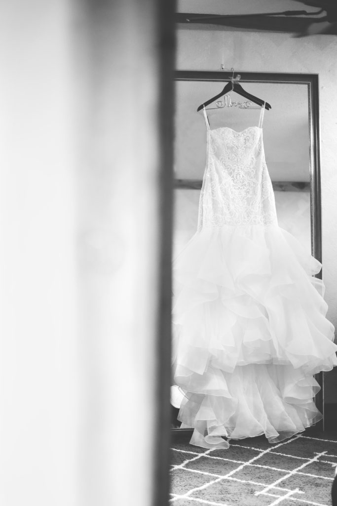 a wedding dress hanging that does not have a corset back that will not affect your wedding timeline