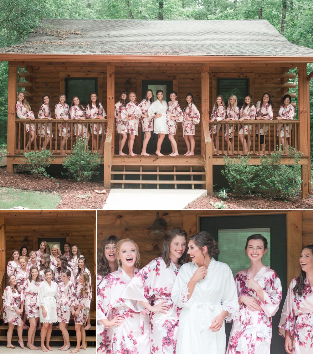 bridesmaids laughing and smiling lined up on the porch of enchanted acre's bridal suite